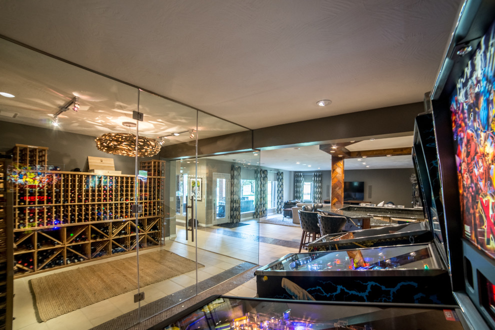 This is an example of a large midcentury wine cellar in Other with ceramic floors.