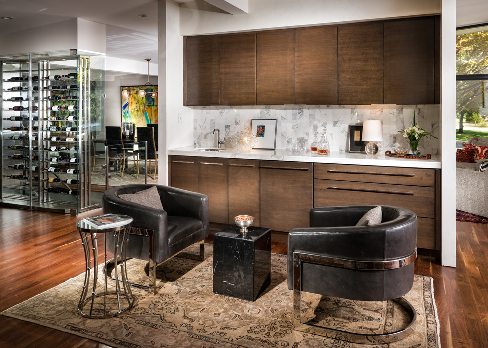 Contemporary single-wall wet bar in Other with stone tile splashback, flat-panel cabinets, an undermount sink, dark wood cabinets, white splashback, dark hardwood floors and white benchtop.