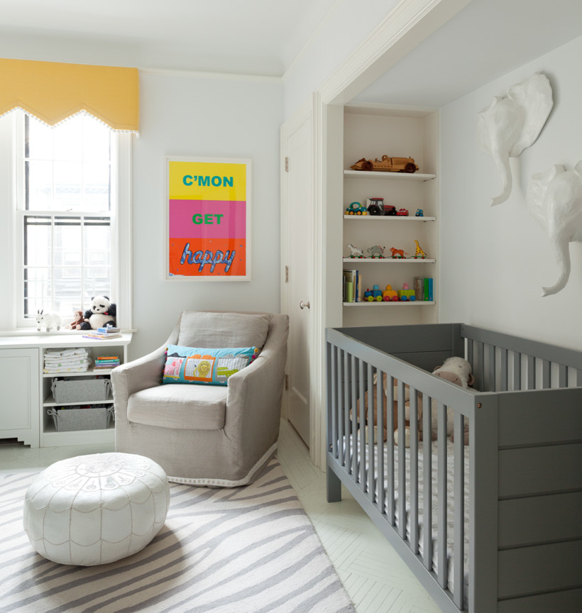 Mid-sized transitional gender-neutral nursery in New York with painted wood floors and white walls.