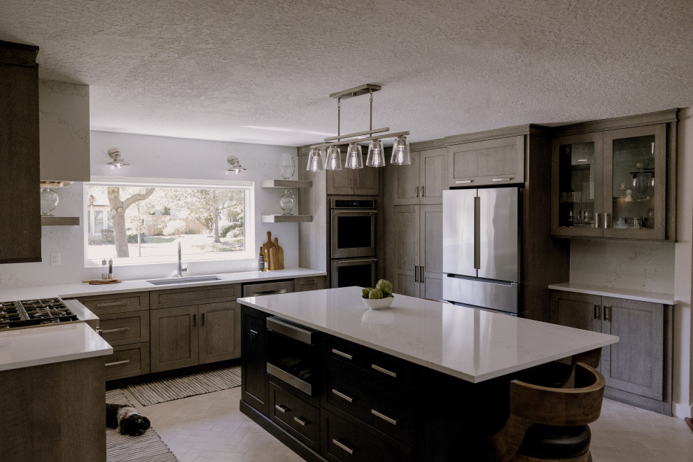 Kitchen - large transitional u-shaped porcelain tile and white floor kitchen idea in Orlando with beaded inset cabinets, light wood cabinets, quartz countertops, white backsplash, quartz backsplash, stainless steel appliances, an island and white countertops