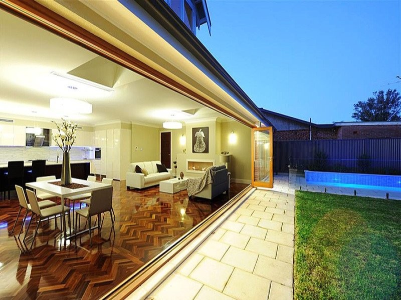 This is an example of an expansive traditional backyard partial sun garden for summer in Adelaide with concrete pavers.