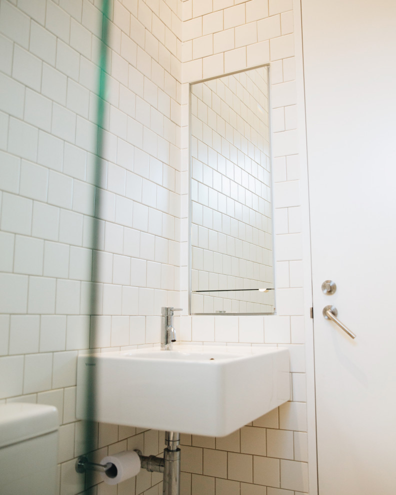 Photo of a small contemporary master bathroom in Sydney with a single vanity.