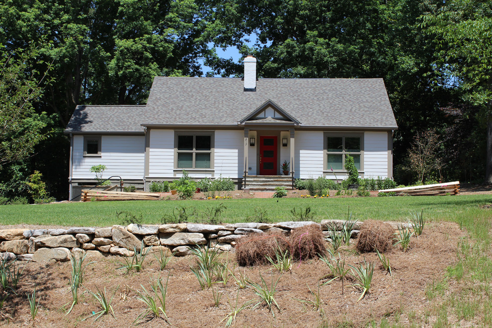 Inspiration for a transitional concrete fiberboard white home design remodel