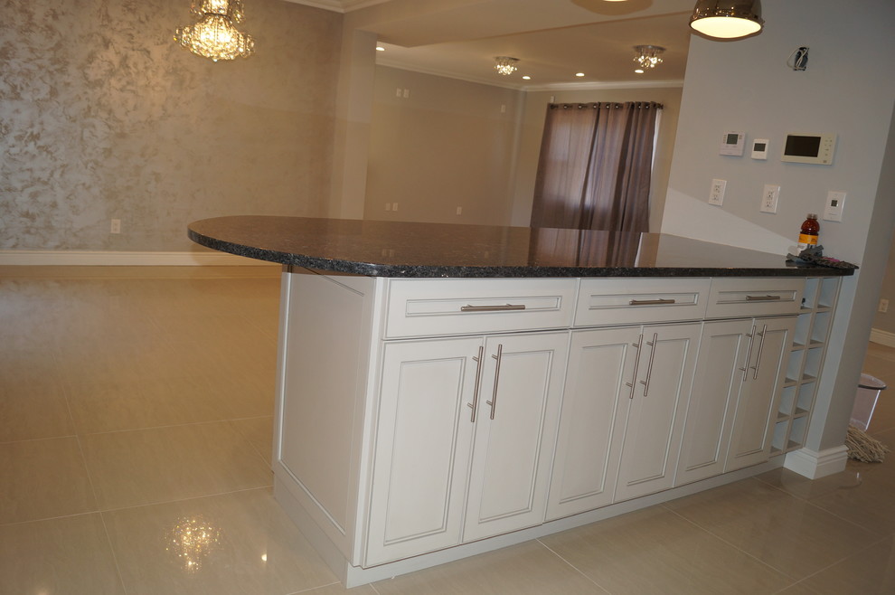 Example of a transitional kitchen design in New York