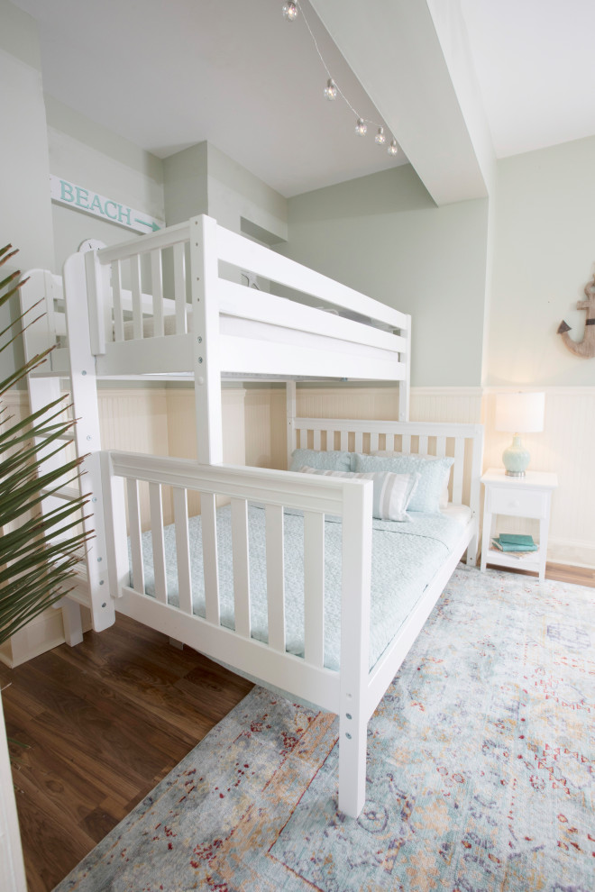Example of a beach style kids' room design in Other