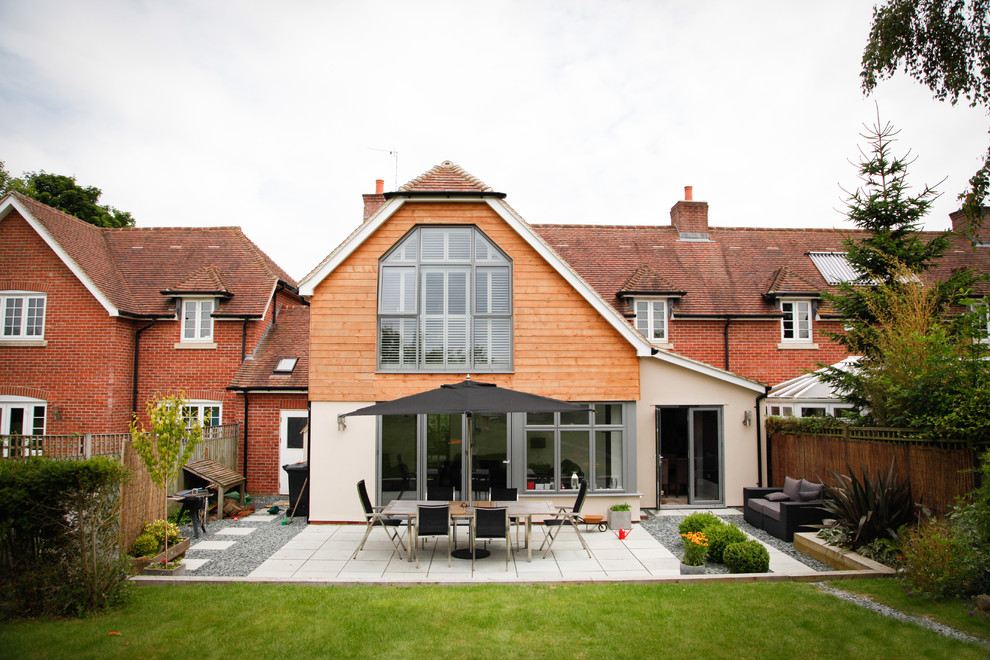 Inspiration for a traditional two-storey exterior in Oxfordshire with a clipped gable roof.