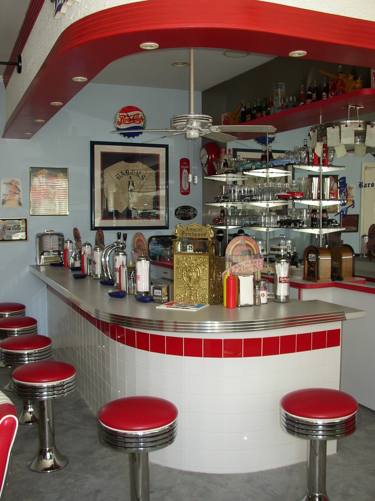 This is an example of an eclectic home bar in Los Angeles.