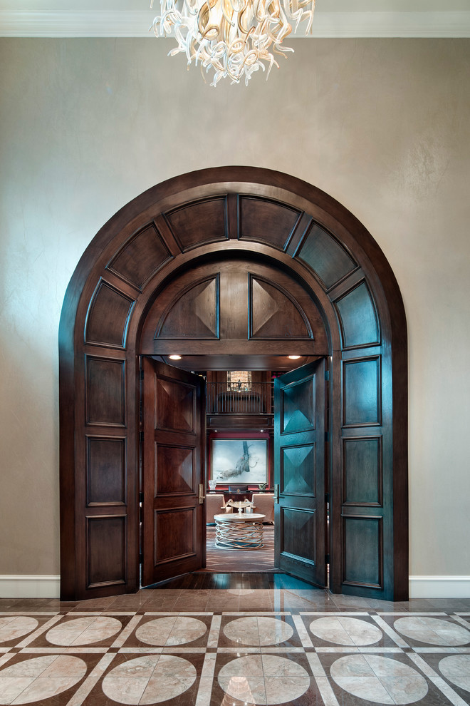 Design ideas for a traditional foyer in Houston with beige walls.