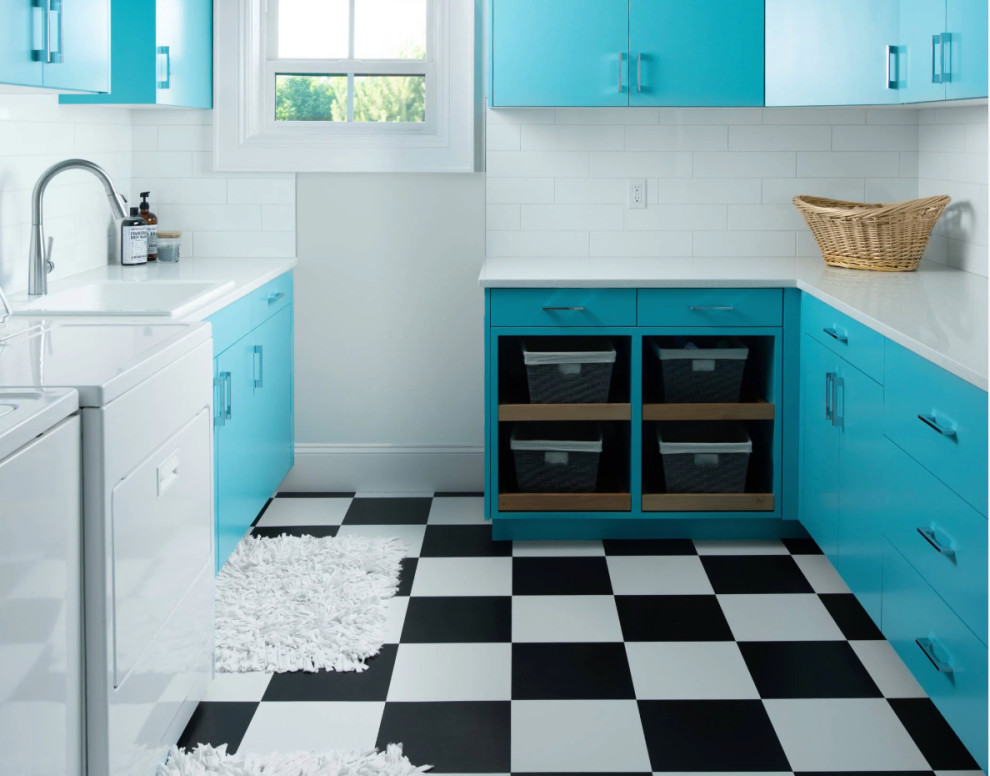 This is an example of a mediterranean u-shaped dedicated laundry room in Other with a drop-in sink, flat-panel cabinets, turquoise cabinets, white walls, a side-by-side washer and dryer, multi-coloured floor and white benchtop.