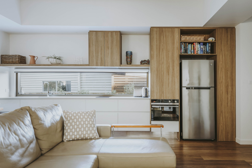 This is an example of a beach style kitchen in Sunshine Coast.