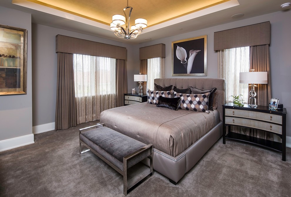 Transitional master bedroom in Miami with grey walls, carpet and grey floor.