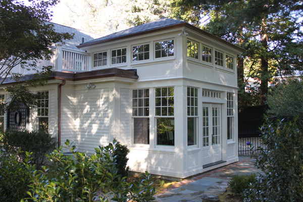Example of a transitional home design design in Boston