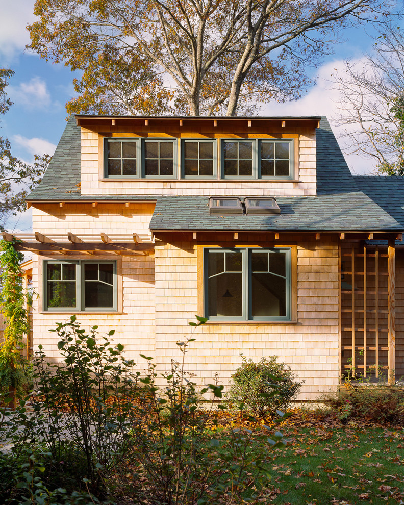 Design ideas for a small traditional two-storey exterior in Boston with wood siding.