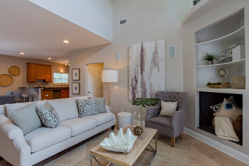 Example of a transitional home design design in Miami
