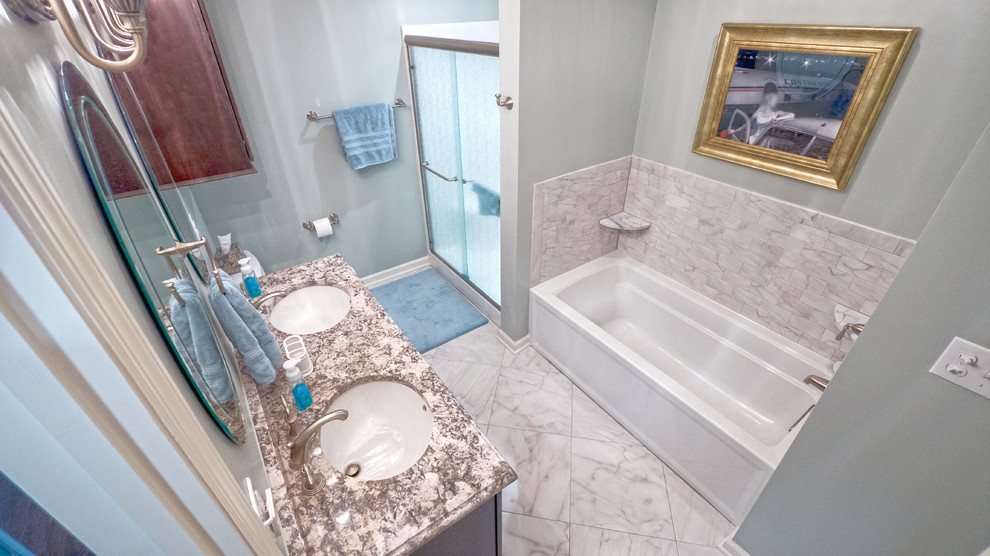 Inspiration for a transitional kids' white tile and ceramic tile ceramic tile alcove shower remodel with an undermount sink, raised-panel cabinets, dark wood cabinets, granite countertops and blue walls
