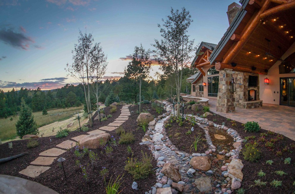 Photo of a rustic landscaping in Denver.