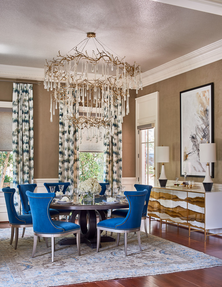 Example of a transitional dark wood floor and brown floor dining room design with beige walls