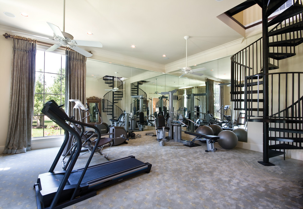 Photo of a traditional home gym in New Orleans with beige walls, carpet and multi-coloured floor.