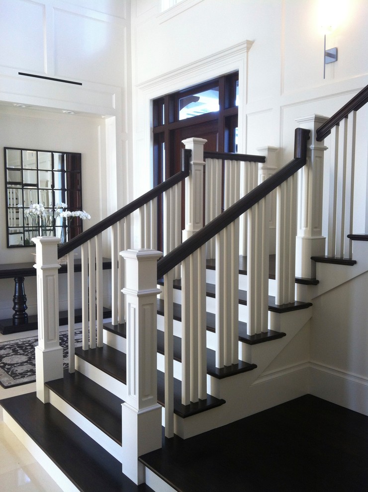 Transitional u-shaped staircase photo in Miami