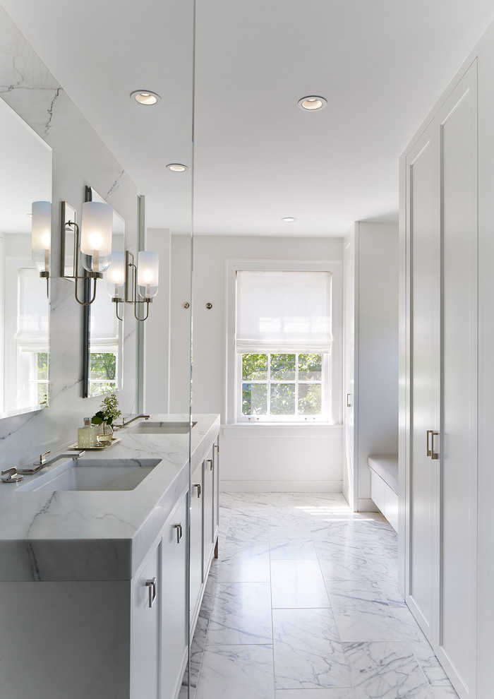Transitional master bathroom in Chicago with beaded inset cabinets, white cabinets, marble, marble floors, an undermount sink, marble benchtops and a hinged shower door.