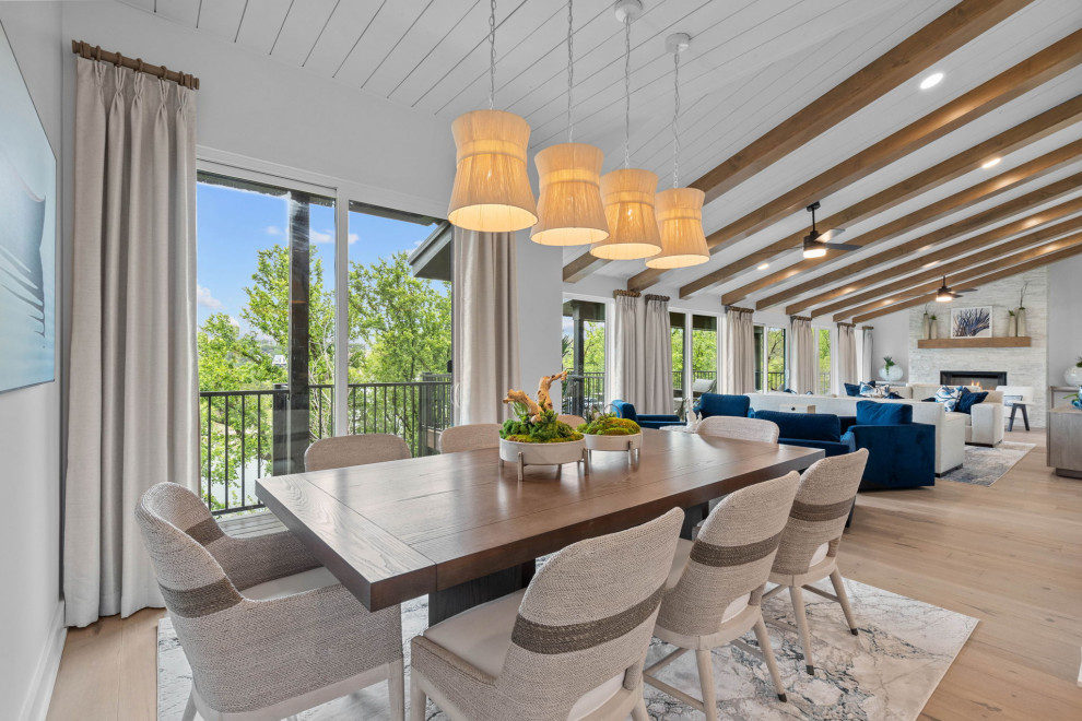 Photo of a medium sized traditional open plan dining room in Dallas with white walls, light hardwood flooring, brown floors and a timber clad ceiling.