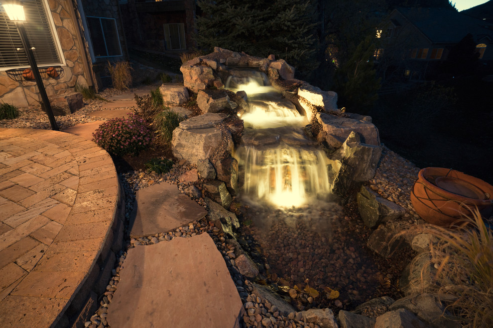 Inspiration for a rustic landscaping in Denver.