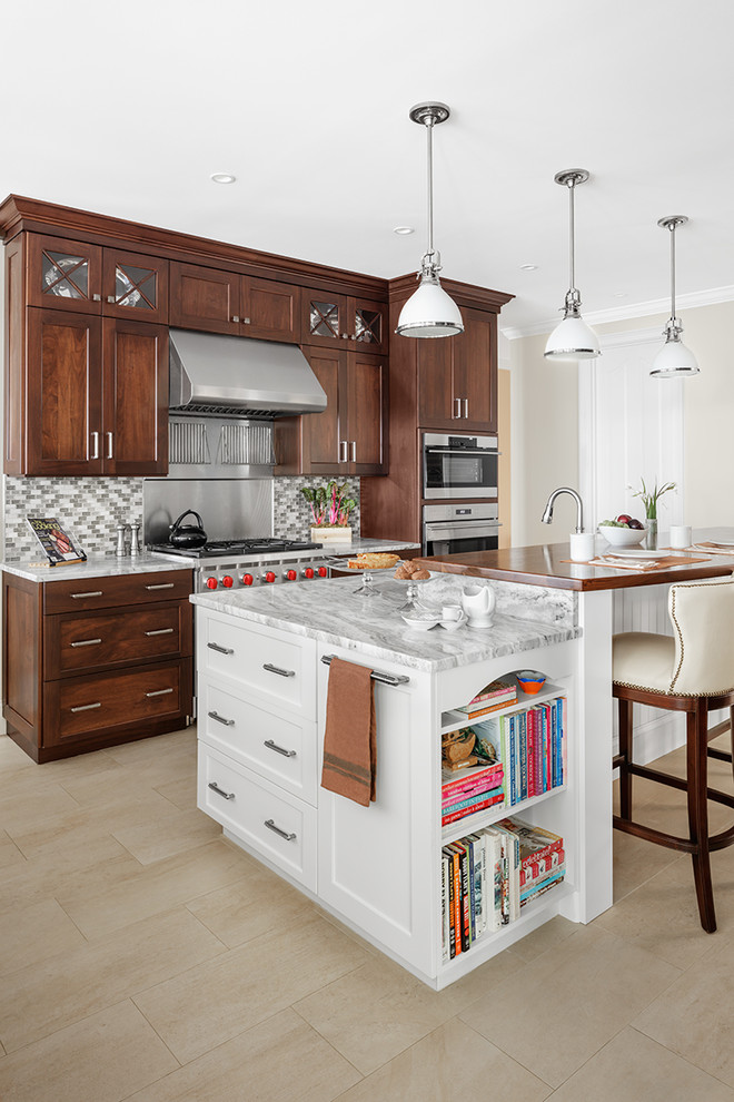 Design ideas for a large traditional kitchen in Other with shaker cabinets, dark wood cabinets, multi-coloured splashback, mosaic tile splashback, stainless steel appliances, beige floor and with island.