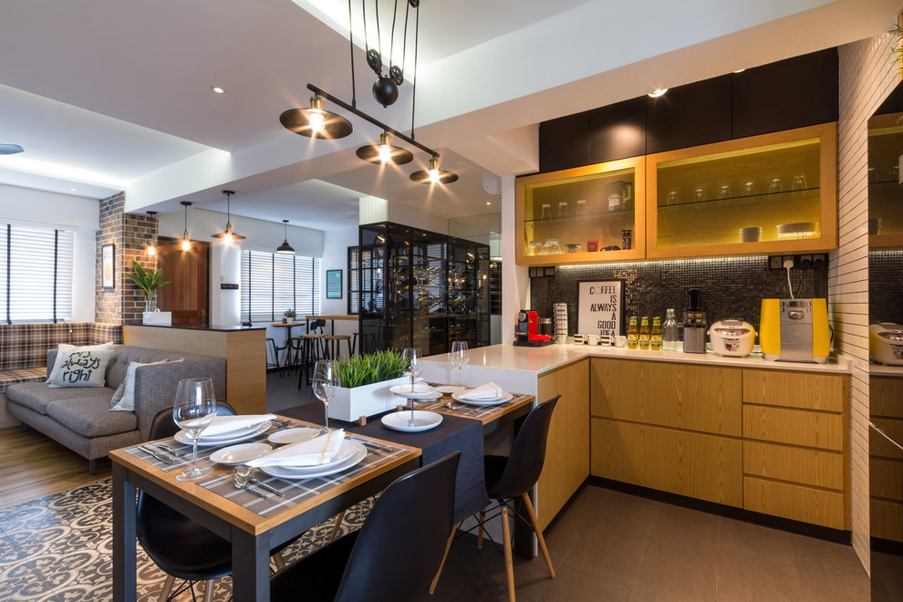 Inspiration for a contemporary u-shaped eat-in kitchen in Singapore with flat-panel cabinets, light wood cabinets, black splashback, mosaic tile splashback, a peninsula, grey floor and white benchtop.