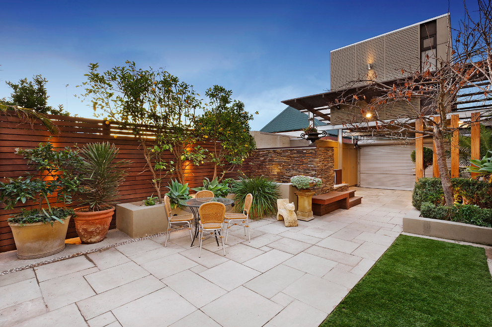Design ideas for a mid-sized contemporary patio in Melbourne with no cover.