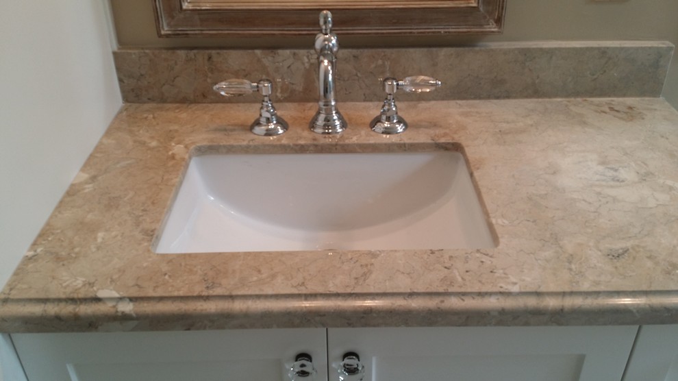 Inspiration for a mid-sized transitional master marble floor home design remodel in Seattle with an undermount sink and marble countertops