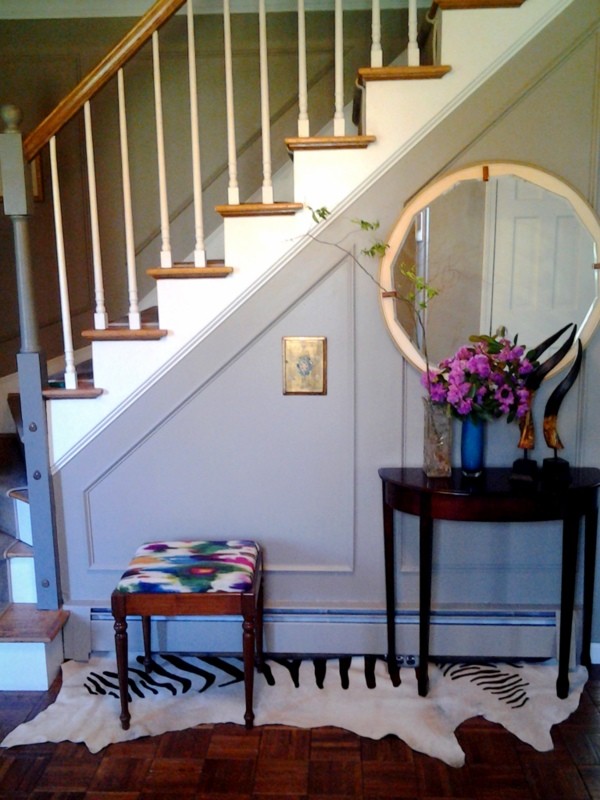 Mid-sized transitional medium tone wood floor foyer photo in Boston with gray walls and a white front door
