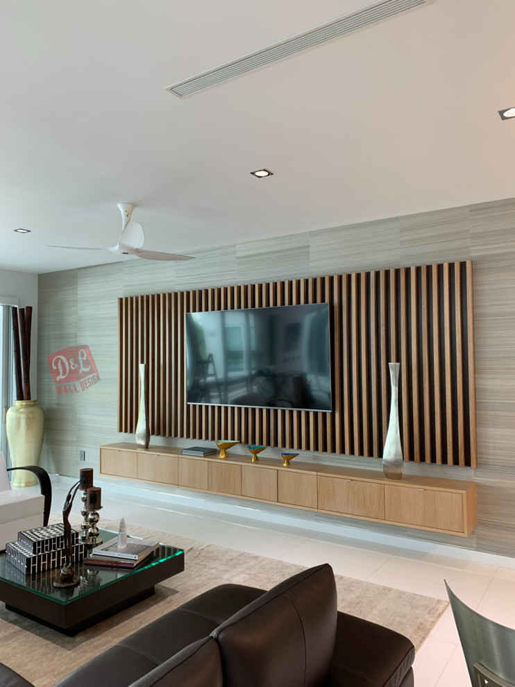 Living room - modern living room idea in Miami with a media wall