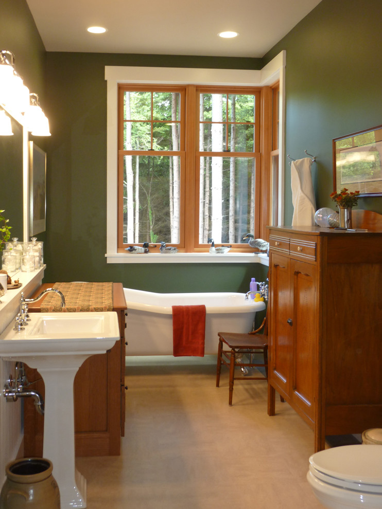 Small arts and crafts bathroom in Seattle with a pedestal sink, a claw-foot tub, a curbless shower, a two-piece toilet, green walls and linoleum floors.