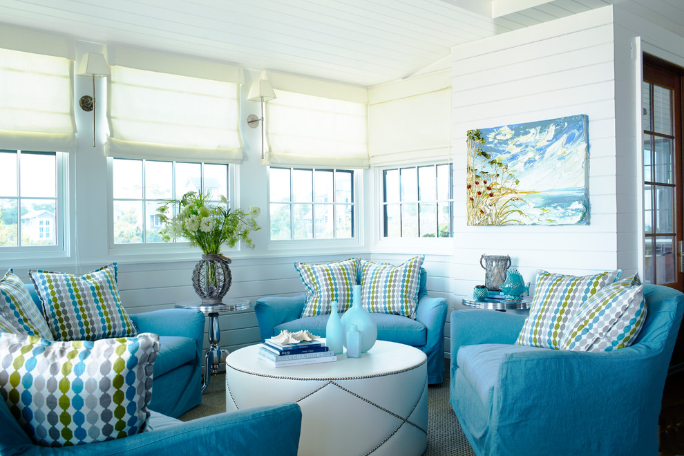 This is an example of a beach style sunroom in Denver.