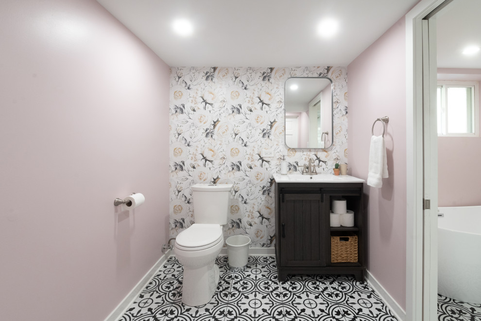 Inspiration for a mid-sized french country master white tile and subway tile ceramic tile, multicolored floor, single-sink and wallpaper bathroom remodel in Chicago with a one-piece toilet, pink walls, solid surface countertops, white countertops and a freestanding vanity