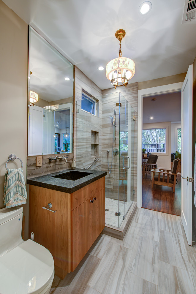 Design ideas for a mid-sized country 3/4 bathroom in San Francisco with flat-panel cabinets, medium wood cabinets, an alcove shower, a one-piece toilet, white tile, stone tile, white walls, vinyl floors, an integrated sink and engineered quartz benchtops.