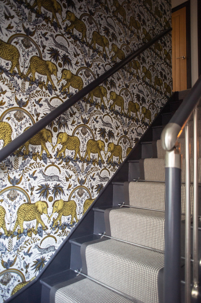 Inspiration for a small traditional staircase in Essex with wallpaper.