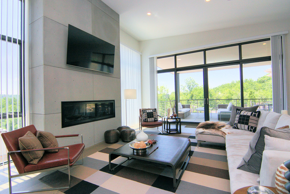 This is an example of a mid-sized modern family room in Cincinnati.
