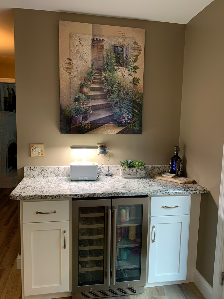Kitchen - transitional kitchen idea with red backsplash