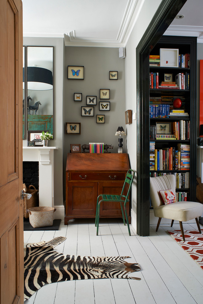 Eclectic home office in London with white floor.