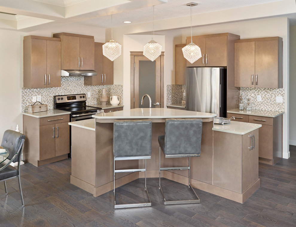 This is an example of a contemporary l-shaped kitchen in Edmonton with flat-panel cabinets, brown cabinets, mosaic tile splashback, stainless steel appliances and beige benchtop.