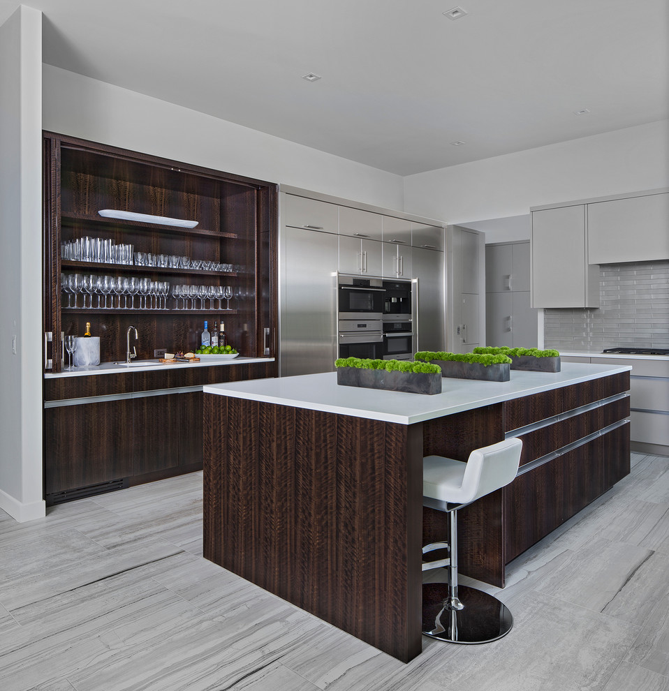 This is an example of a contemporary separate kitchen in Detroit with grey cabinets and with island.