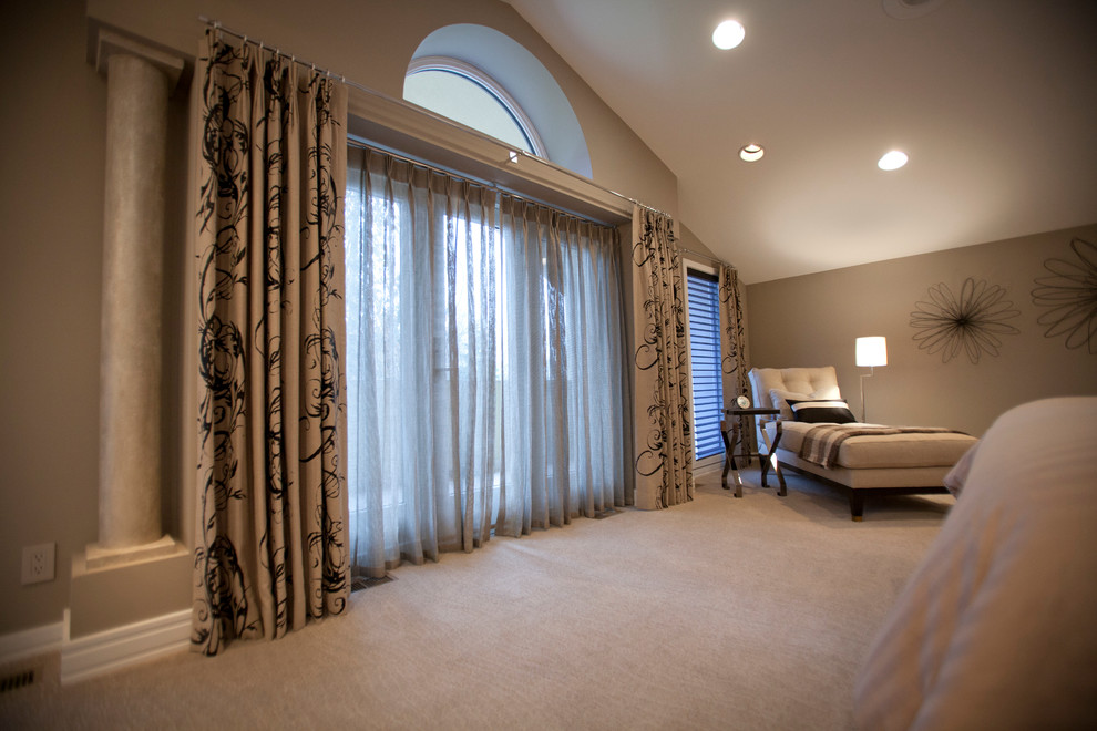 Large contemporary master bedroom in Cincinnati with beige walls, carpet, no fireplace and beige floor.