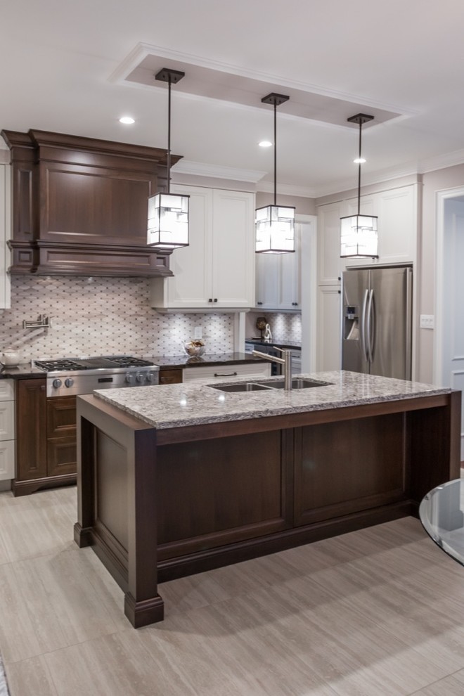 Example of a mid-sized transitional l-shaped ceramic tile eat-in kitchen design in Toronto with shaker cabinets, granite countertops, mosaic tile backsplash, stainless steel appliances, an island, gray backsplash, a double-bowl sink and white cabinets