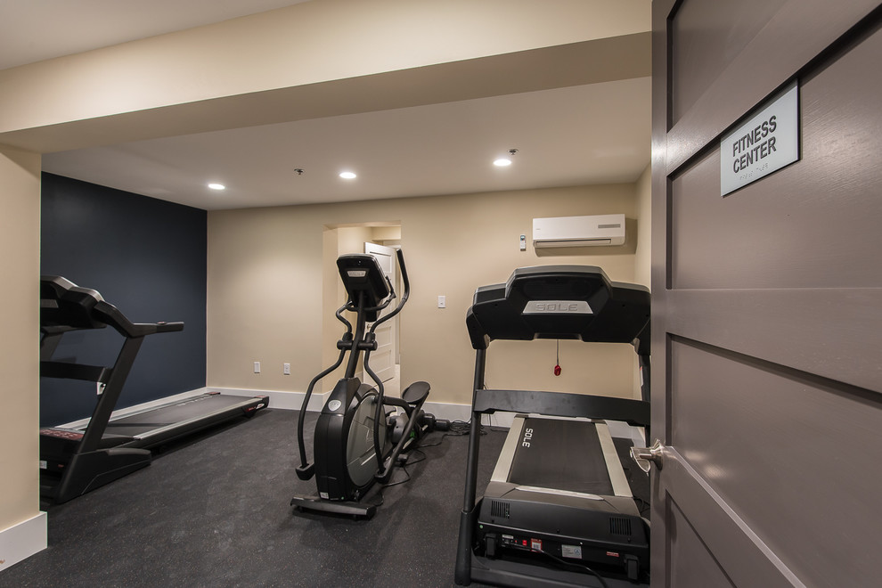 Photo of a transitional home gym in Boston.
