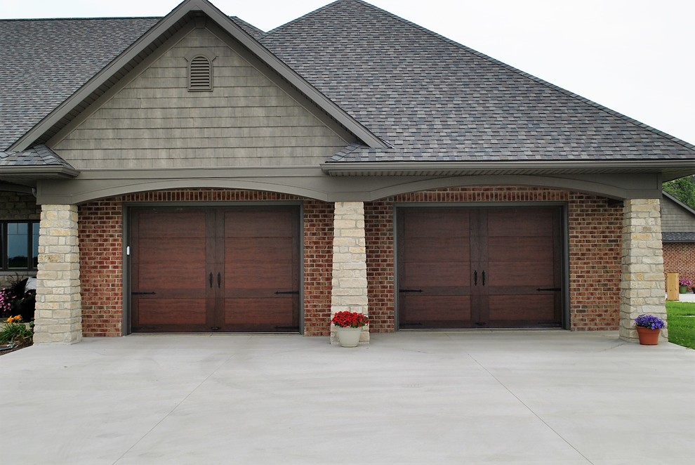 Attached two-car garage photo in Other