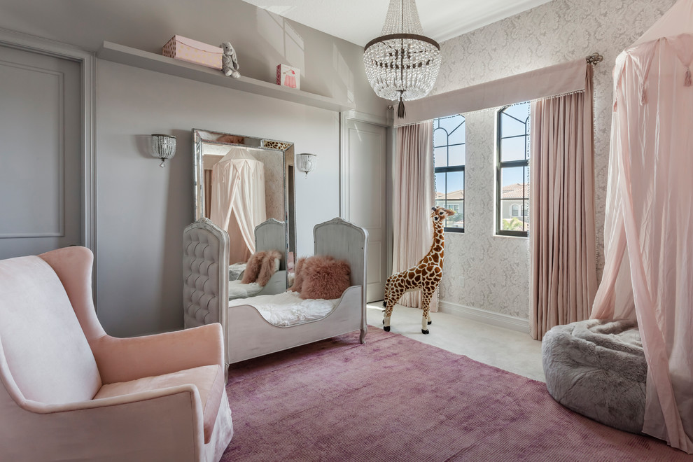 This is an example of a transitional kids' room for girls in Miami with grey walls.