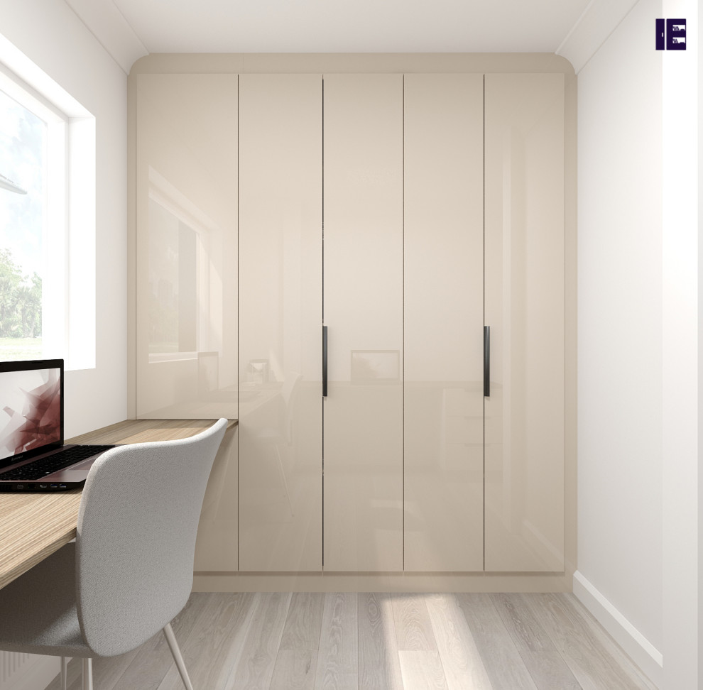 Small modern built-in wardrobe in London with flat-panel cabinets, beige cabinets, marble flooring, multi-coloured floors and a wood ceiling.