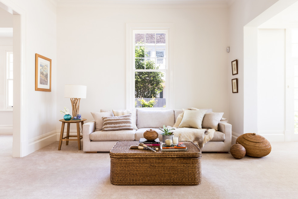 Design ideas for a large transitional open concept living room in Melbourne with white walls, carpet and no tv.