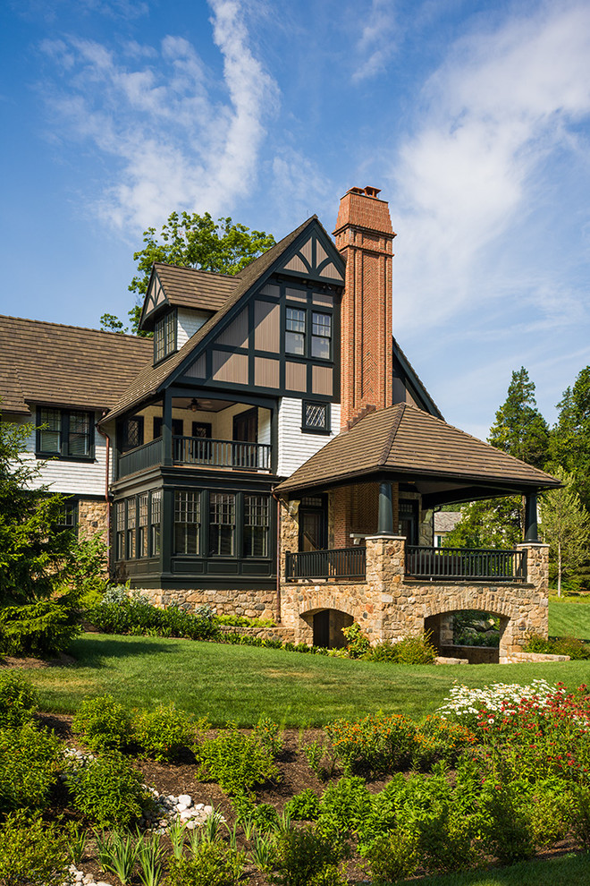 Photo of a traditional exterior in Philadelphia with stone veneer.